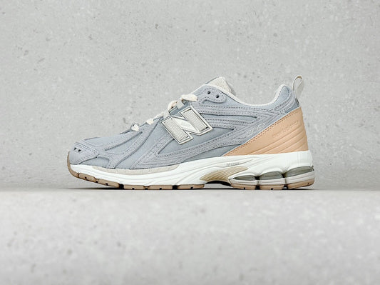 New Balance 1906 - gris / saumon